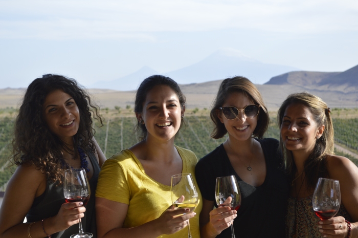 enjoying the view of Mount Ararat with goblets of wine